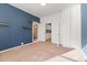 Bedroom featuring carpeted floors, closet, and shelving at 3300 W 2Nd Ave, Denver, CO 80219