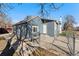 Exterior angle showcasing a fenced perimeter with well-maintained yard at 3300 W 2Nd Ave, Denver, CO 80219