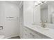 Clean bathroom featuring a spacious vanity with ample storage space and a well-lit mirror at 1777 Larimer St # 608, Denver, CO 80202