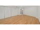 Large room with hardwood floors, double doors, and closet at 1777 Larimer St # 608, Denver, CO 80202