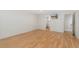 Bedroom with hardwood floors and a flatscreen television on the wall at 1777 Larimer St # 608, Denver, CO 80202