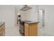 Modern kitchen featuring stainless steel appliances, granite countertops, and an island at 1777 Larimer St # 608, Denver, CO 80202
