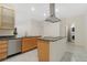 Bright kitchen featuring stainless steel appliances, granite countertops, and a modern island at 1777 Larimer St # 608, Denver, CO 80202