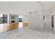 Spacious open floor plan with hardwood and tile flooring throughout the living and dining spaces at 1777 Larimer St # 608, Denver, CO 80202