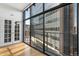 Bright living room with floor-to-ceiling windows and hardwood flooring at 1777 Larimer St # 608, Denver, CO 80202