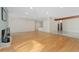 Bright living room with hardwood floors and a fireplace at 1777 Larimer St # 608, Denver, CO 80202