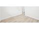 A bright bedroom with light-colored floors and neutral walls at 8307 E Lehigh Dr, Denver, CO 80237