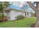 Well maintained one-story home featuring a freshly painted exterior and manicured lawn at 8307 E Lehigh Dr, Denver, CO 80237