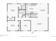 First floor layout featuring kitchen, dining room, living room, bedrooms, bathrooms, and office at 8307 E Lehigh Dr, Denver, CO 80237