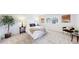 Comfortable bedroom with neutral tones, plush carpeting, cozy bedding, and ambient lighting at 11738 Zenobia Loop, Westminster, CO 80031