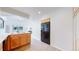 Bright kitchen featuring wood cabinets, stainless steel sink and updated appliances in a well-lit space at 11738 Zenobia Loop, Westminster, CO 80031