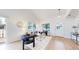 Bright living room featuring modern decor and a walk-out to a patio at 11738 Zenobia Loop, Westminster, CO 80031
