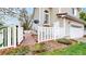 Charming side yard with a stamped concrete walkway leading to a gated entrance at 11738 Zenobia Loop, Westminster, CO 80031