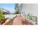 Side yard features a stamped concrete walkway and fenced perimeter at 11738 Zenobia Loop, Westminster, CO 80031