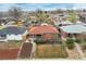 Aerial view of a lovely home in a quiet neighborhood with mature trees and well-kept lawns at 3670 Ivanhoe St, Denver, CO 80207