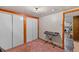 Bedroom has a closet with sliding doors and electronic keyboard for music enthusiasts at 3670 Ivanhoe St, Denver, CO 80207