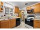 Efficient kitchen with plenty of counter space, modern appliances, and a convenient layout for cooking at 3670 Ivanhoe St, Denver, CO 80207