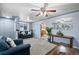 Cozy living room with hardwood floors, neutral walls, and comfortable seating arrangements at 3670 Ivanhoe St, Denver, CO 80207