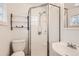 Clean bathroom with shower stall, toilet and sink at 4415 Grant St, Denver, CO 80216