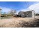 The home features a nice sized backyard, patio, and grassy area at 8441 Mcdougal St, Denver, CO 80229