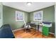 Bright office space with hardwood floors, ample natural light from the window, and contemporary furnishings at 8441 Mcdougal St, Denver, CO 80229