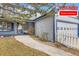 Charming two-story home with a front porch swing and a well-manicured lawn featuring $10,000 buyer incentive at 7729 Beverly Blvd, Castle Pines, CO 80108