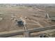 Wide aerial view of a single-Gathering home and surrounding neighborhood at 16301 Hudson Rd, Hudson, CO 80642