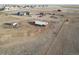 Very wide aerial view of a single-Gathering home and surrounding neighborhood at 16301 Hudson Rd, Hudson, CO 80642