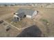 Aerial view of a single-Gathering home featuring a covered back patio at 16301 Hudson Rd, Hudson, CO 80642