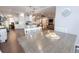 Open dining area with a view into the kitchen and living room at 16301 Hudson Rd, Hudson, CO 80642