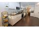 Bright kitchen with white cabinets, stainless appliances, and granite countertops at 16301 Hudson Rd, Hudson, CO 80642