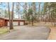 Spacious driveway leading to a two-car attached garage at 1150 Fremont Dr, Larkspur, CO 80118