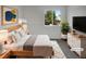 Cozy bedroom featuring a comfortable bed, soft lighting, and a tranquil ambiance at 12550 Eastlake Dr, Thornton, CO 80241