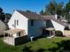 Picture of the backyard with a patio and a well maintained lawn at 230 S 22Nd Ave, Brighton, CO 80601