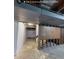 Unfinished basement space with exposed beams and concrete floor at 230 S 22Nd Ave, Brighton, CO 80601