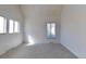 Bright bedroom with neutral walls, carpet floors, and multiple windows at 230 S 22Nd Ave, Brighton, CO 80601