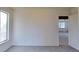 Bedroom features neutral walls, carpet floors, and a bright window at 230 S 22Nd Ave, Brighton, CO 80601