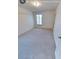 Bright bedroom featuring neutral paint and carpeting and a single window at 230 S 22Nd Ave, Brighton, CO 80601