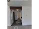 View of the entryway with a staircase leading upstairs and plank floors at 230 S 22Nd Ave, Brighton, CO 80601
