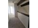 Hallway on the second floor, featuring hardwood trim, modern lighting, and fresh paint at 230 S 22Nd Ave, Brighton, CO 80601