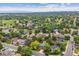 Beautiful aerial view of the neighborhood with a green field for recreation at 8268 W Caley Pl, Littleton, CO 80123