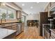 Cozy eat-in kitchen with stainless steel appliances and breakfast nook at 8268 W Caley Pl, Littleton, CO 80123