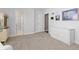 Bright room with open entryways and neutral walls at 1774 Spring Water Pl, Highlands Ranch, CO 80129