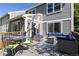 Relax and unwind on the deck featuring stylish outdoor furniture and a table at 1774 Spring Water Pl, Highlands Ranch, CO 80129