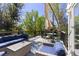 Enjoy outdoor living on this deck with comfortable patio furniture at 1774 Spring Water Pl, Highlands Ranch, CO 80129