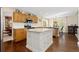 Bright kitchen with wooden cabinets, granite countertops, and stainless steel appliances at 1774 Spring Water Pl, Highlands Ranch, CO 80129