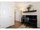 Hallway with a music room featuring a piano and decor lighting, providing an inviting space for music at 1774 Spring Water Pl, Highlands Ranch, CO 80129