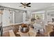 Cozy living room with barn doors leading to other rooms in the house at 3052 S Gilpin St, Denver, CO 80210