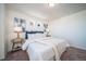 Inviting bedroom with a comfortable bed, modern decor, and bright lighting at 46533 Avery Ln, Bennett, CO 80022