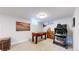 Finished basement includes a foosball table and a treadmill at 1741 W 55Th Pl, Denver, CO 80221